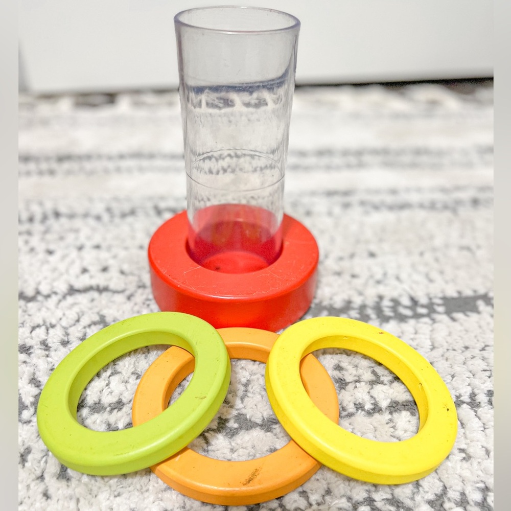 Lovevery clear tube ring stacker toy